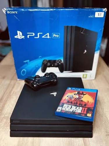 Sony PS4 Pro usada con 5 juegos físicos